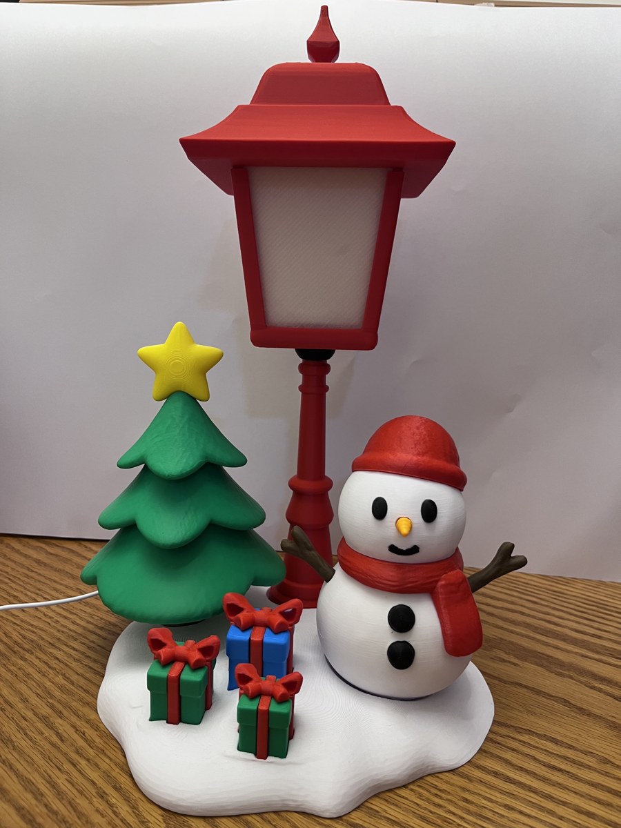Poste luminoso com boneco de neve