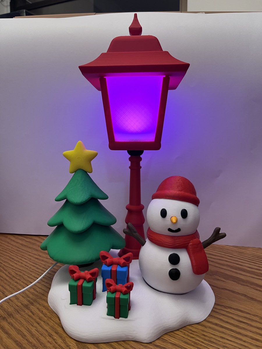 Poste luminoso com boneco de neve