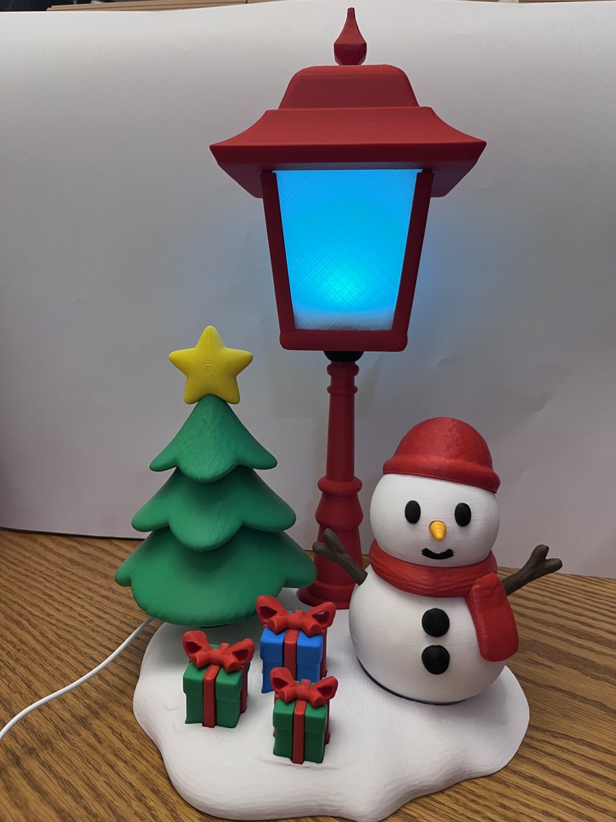 Poste luminoso com boneco de neve